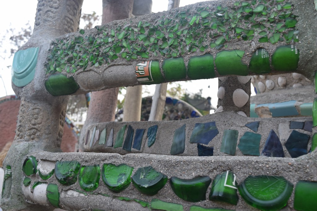 Mosaic with glass bottles.