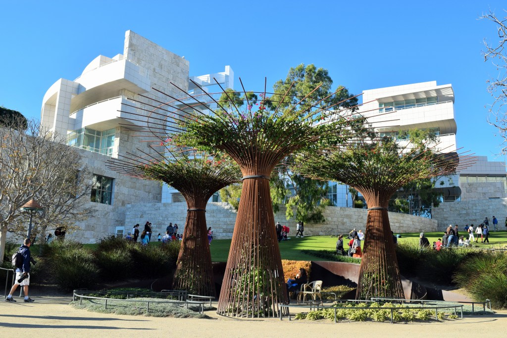 Arbors with bougainvillea in the plaza of the central garden.
