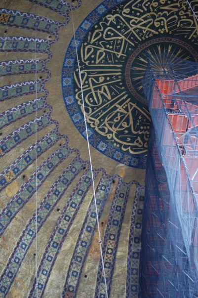 Scaffolding facilitates restoration of the ceiling.