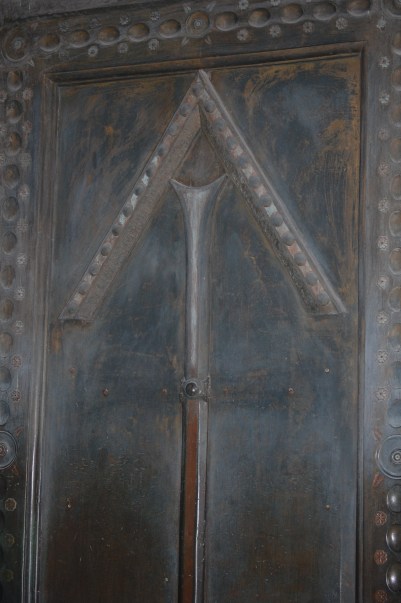 A cross with the vertical parts removed. You can still see the shadow, though it is probably over 500 years old.