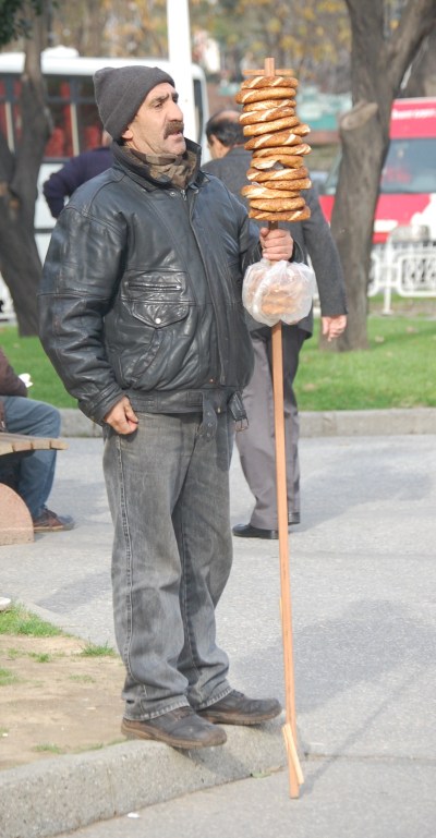 Man selling simmits, a sort of Turkish bagel.