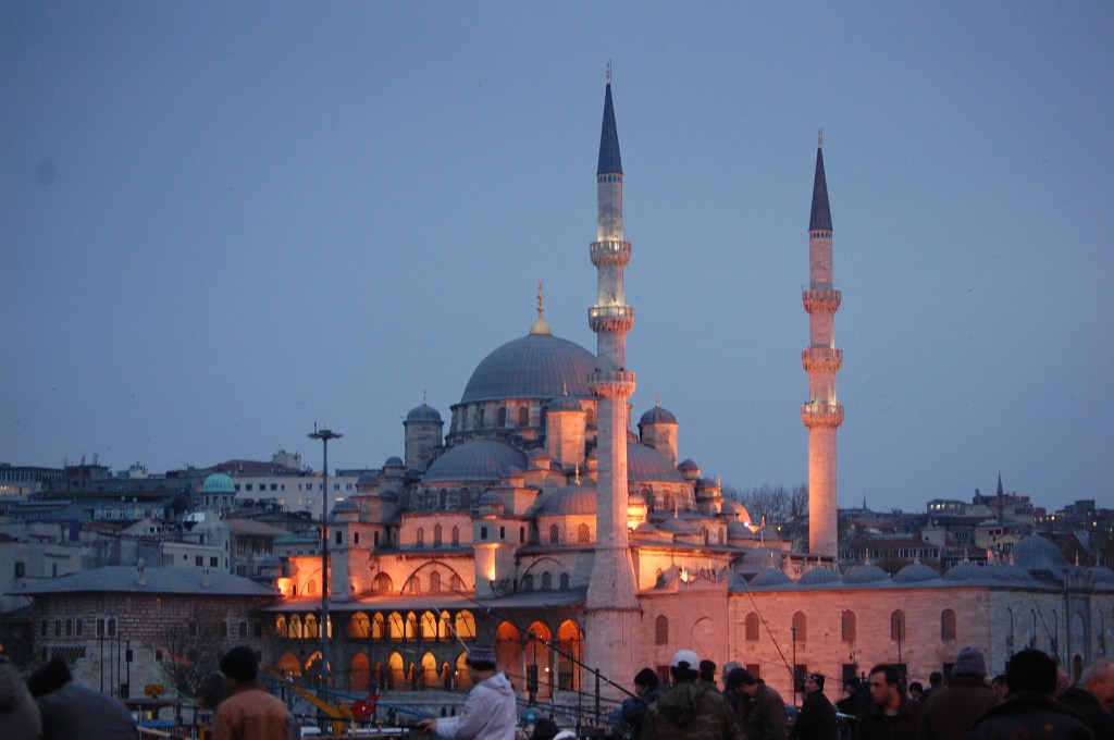 Lights illuminating the New Mosque, at the southern end of the bridge.